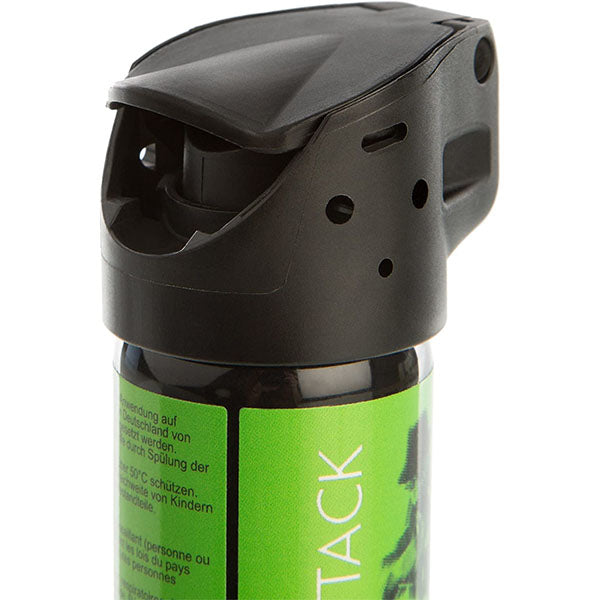 Pava – Nahaufnahme des Sprühkopfs des grünen CANNON ANTI ATTACK 33 ml mit Fingerschutz und Auslösemechanismus