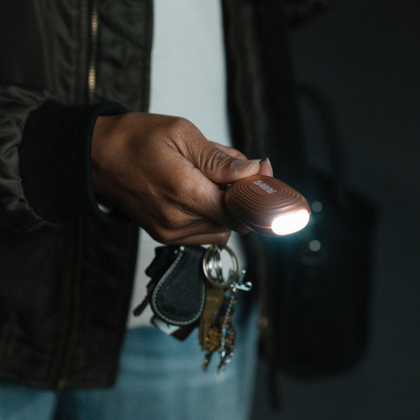 Schrillalarm 2-in-1 Personal Alarm mit LED Licht & Karabinerhaken, bronze